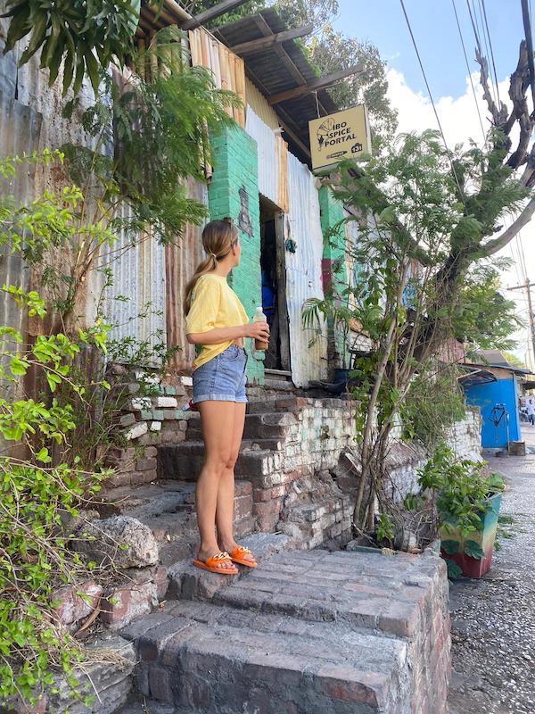 Me in front of Ibo spice downtown Kingston