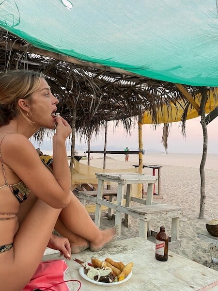 me eating fish at oceans beach in Hellshire